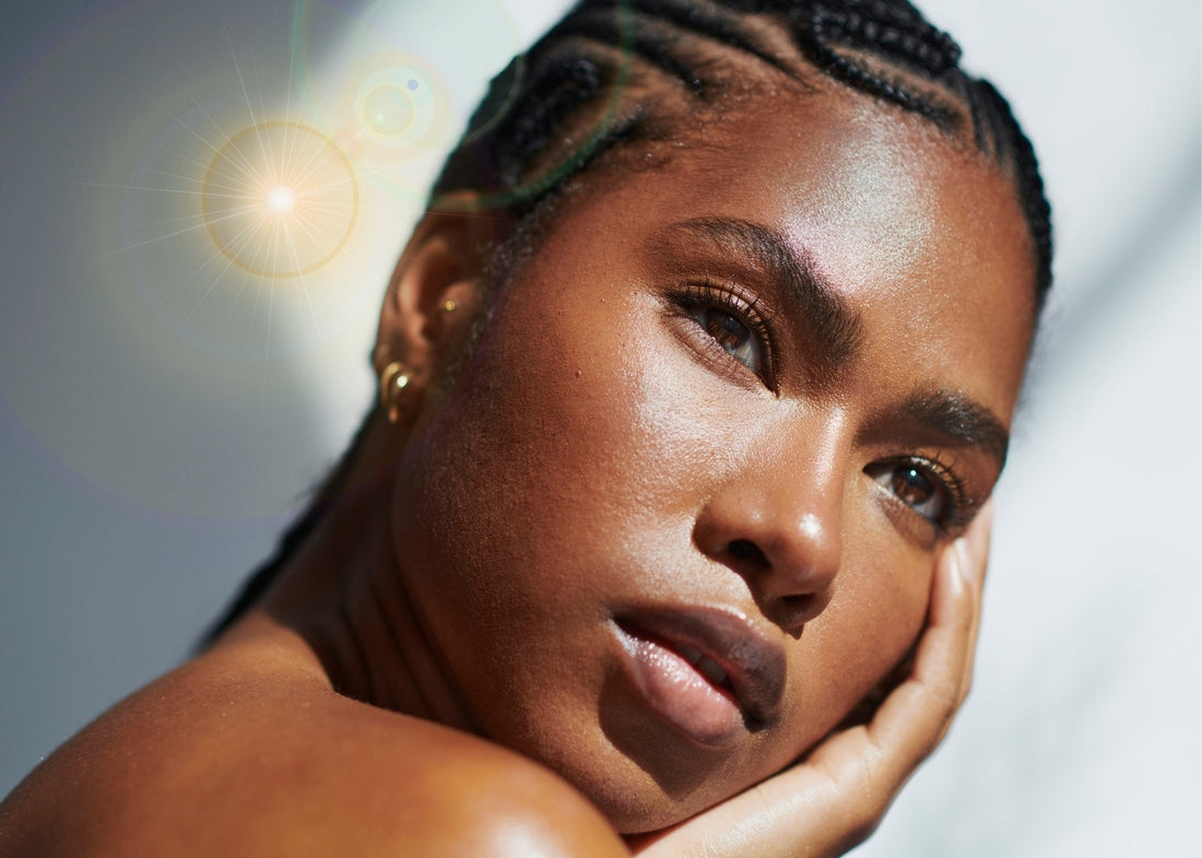 Young Black woman in sunlight