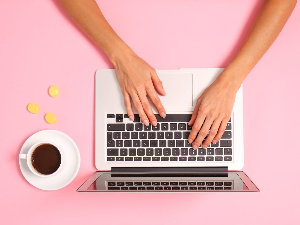 Woman signing up for Yany beauty ambassador program on laptop